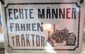 Blechschild "Echte Männer fahren Traktor"